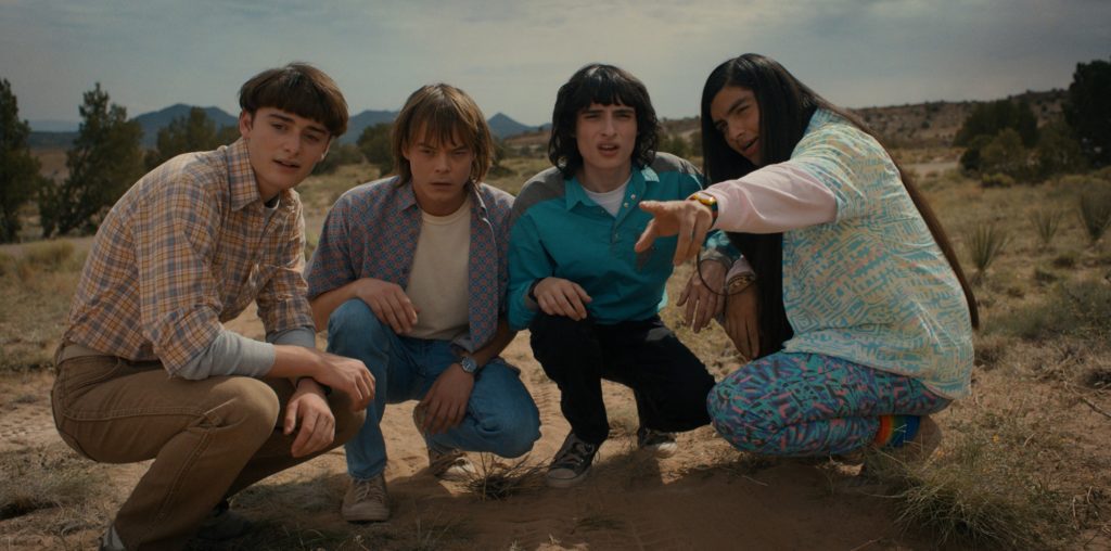 Noah Schnapp as Will Byers, Charlie Heaton as Jonathan Byers, Finn Wolfhard as Mike Wheeler, and Eduardo Franco as Argyle in STRANGER THINGS Netflix
